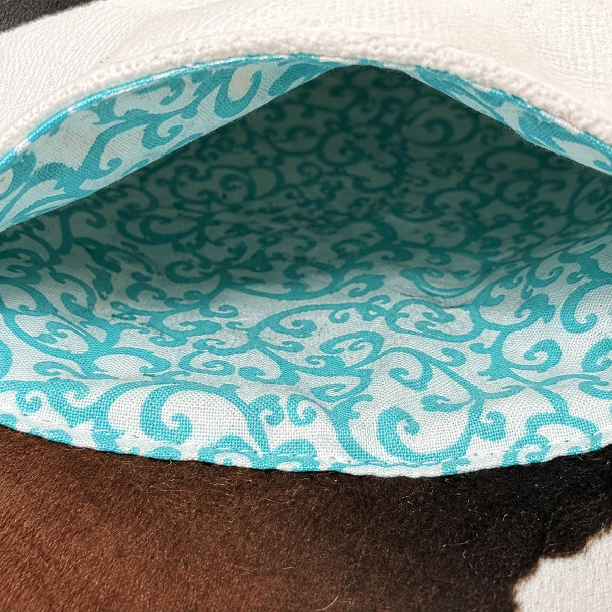 Rancher Crossbody – Cow Print & Black Vegan Leather Bag